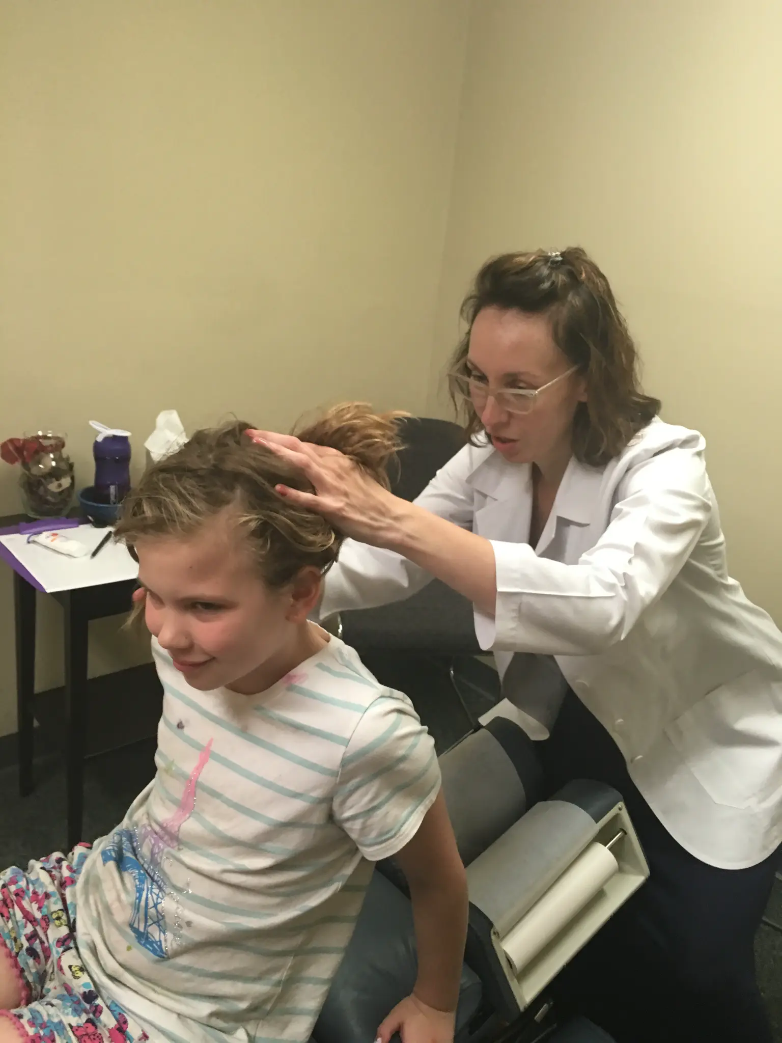Dr. Lisa Bates treating patient